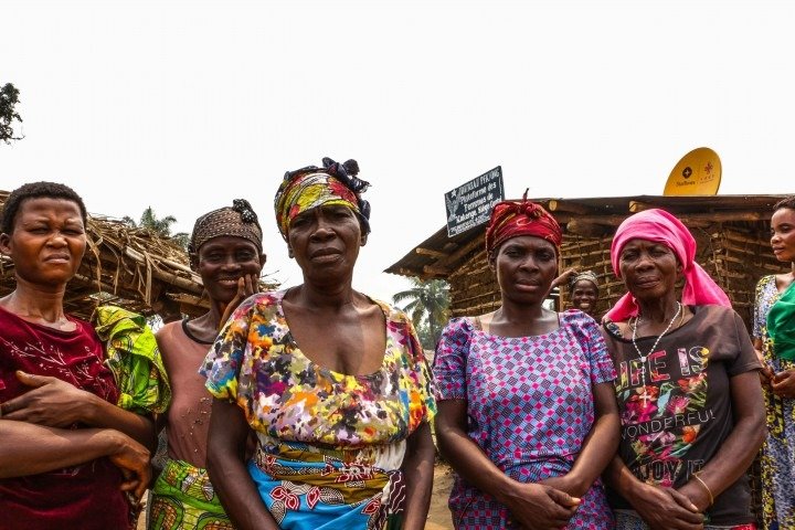 F.T & Foundation's sewing classes program help empower vulnerable lives in Congo Group of Congolese women standing together in a rural village.